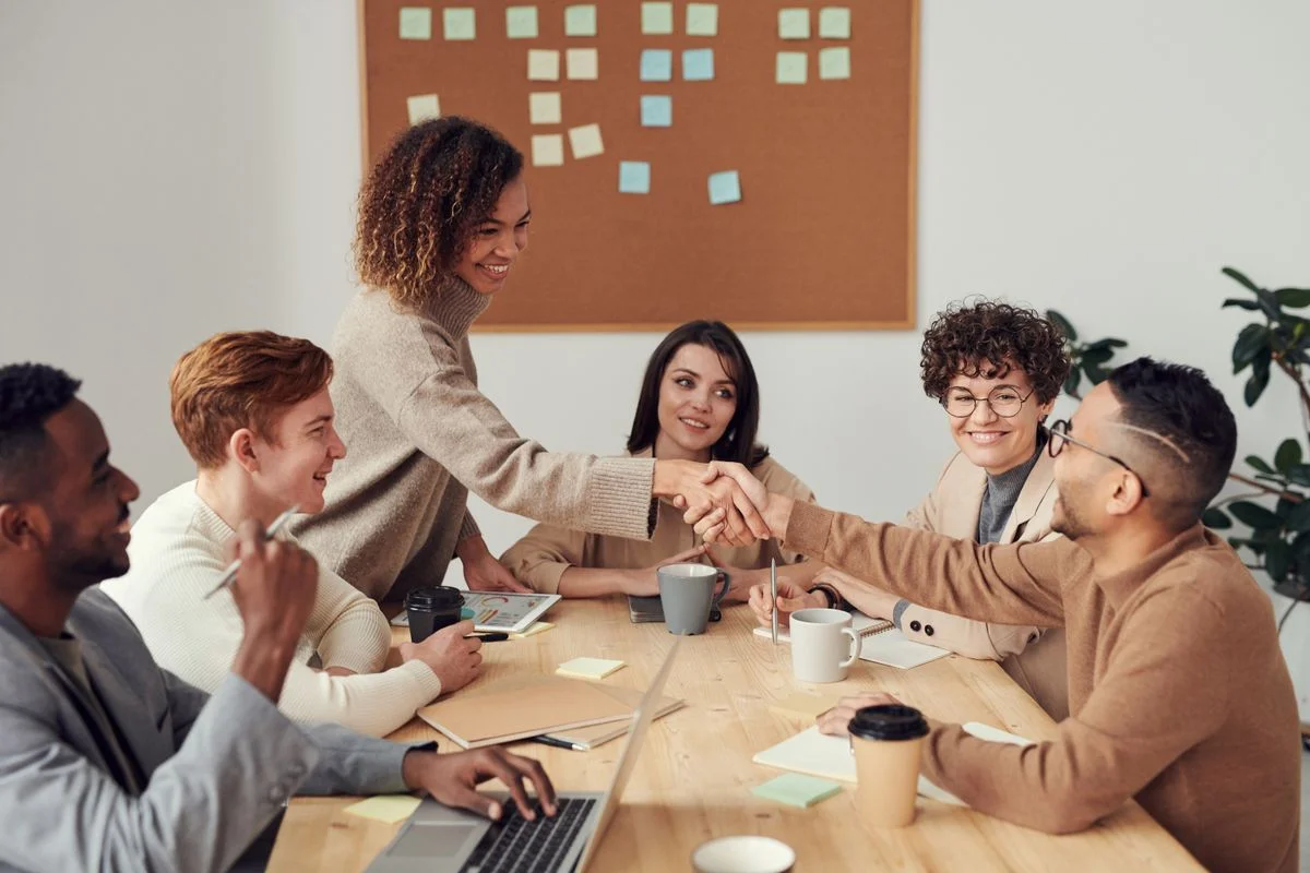 A multidisciplinary team collaborating around a table